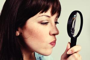 
		Woman with magnifying glass
	